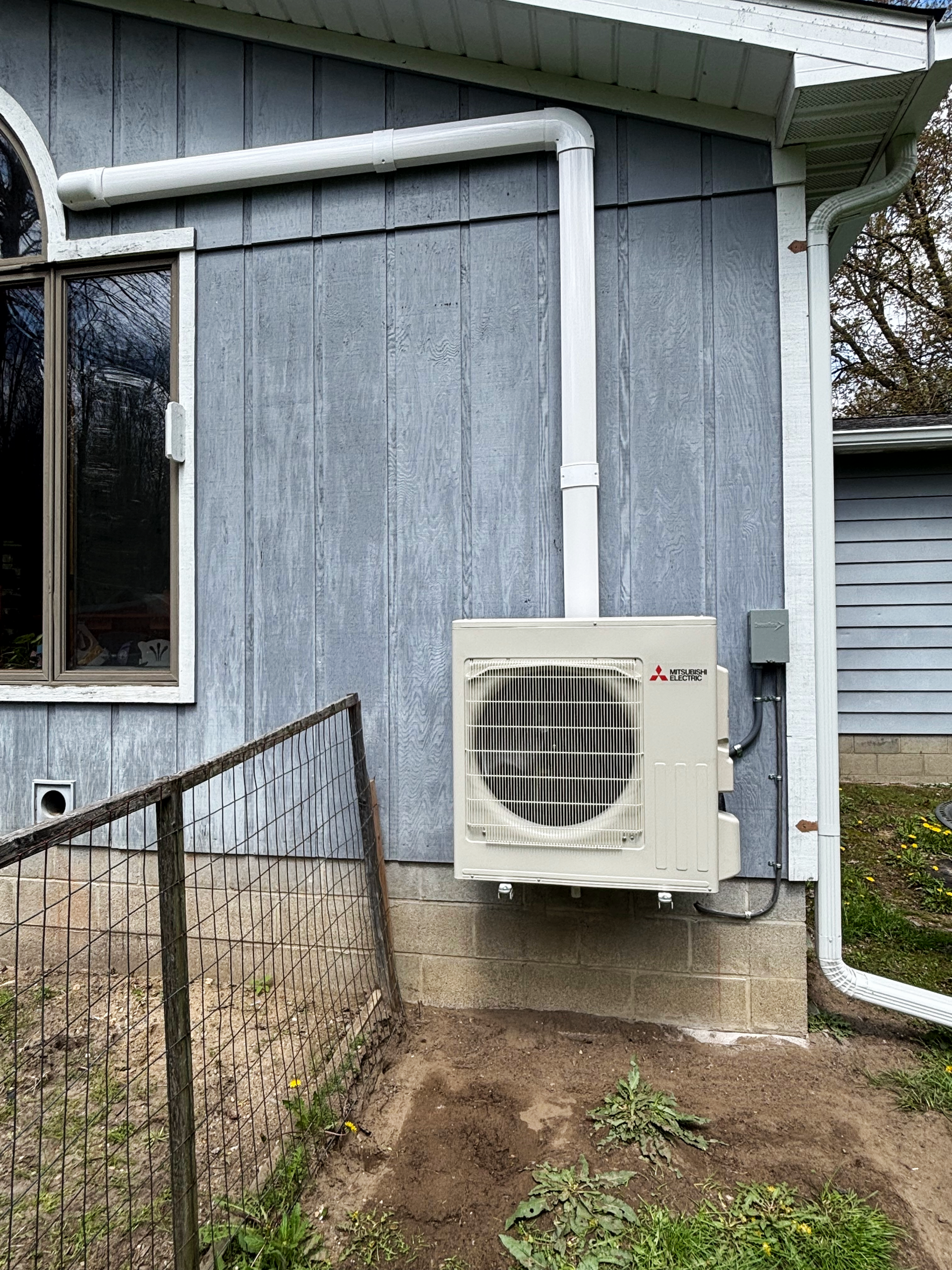 Outdoor heat pump unit installed by S. Finzel Mechanical